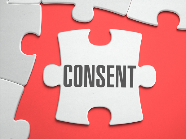 The word consent on a puzzle piece